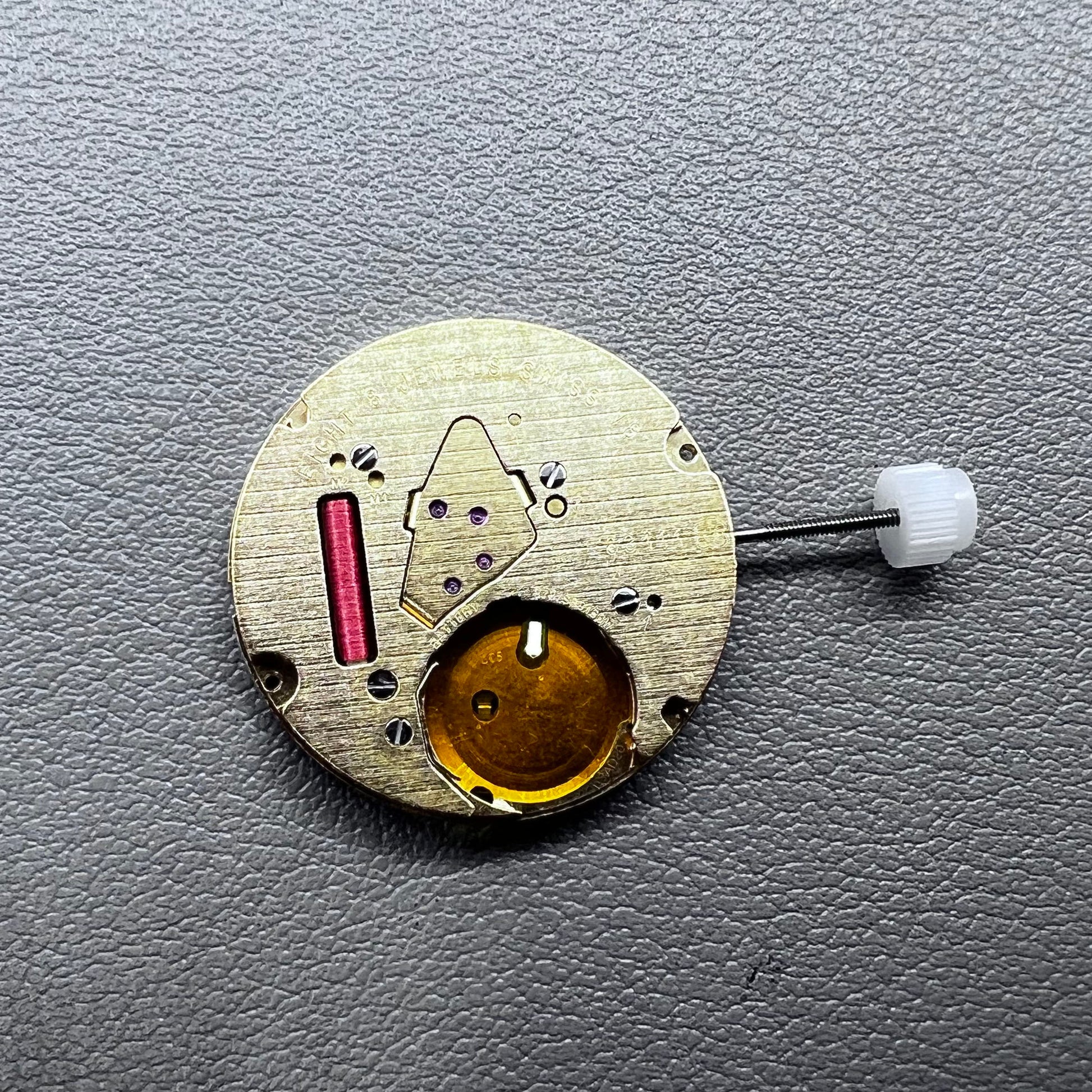 Swiss ETA E63.111 quartz watch movement with 3 hands and date display at 3 o?clock for precise timekeeping.