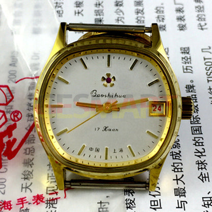33mm Shanghai manual watch with golden nail markers, white dial, and single calendar display.