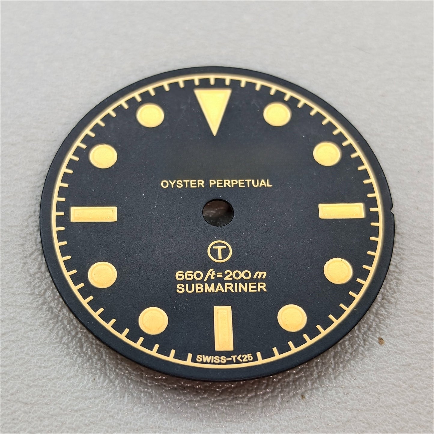 watch dial with R logo