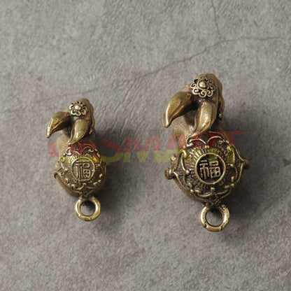 Hand-carved solid copper Blessing Rabbit pendant with detailed bronze finish, perfect watch accessory.