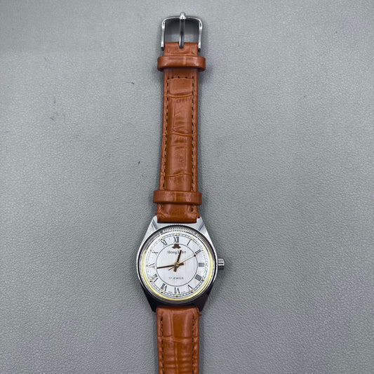 HONGLIAN 32mm brown leather band manual watch with 17 jewels and Roman numeral dial.