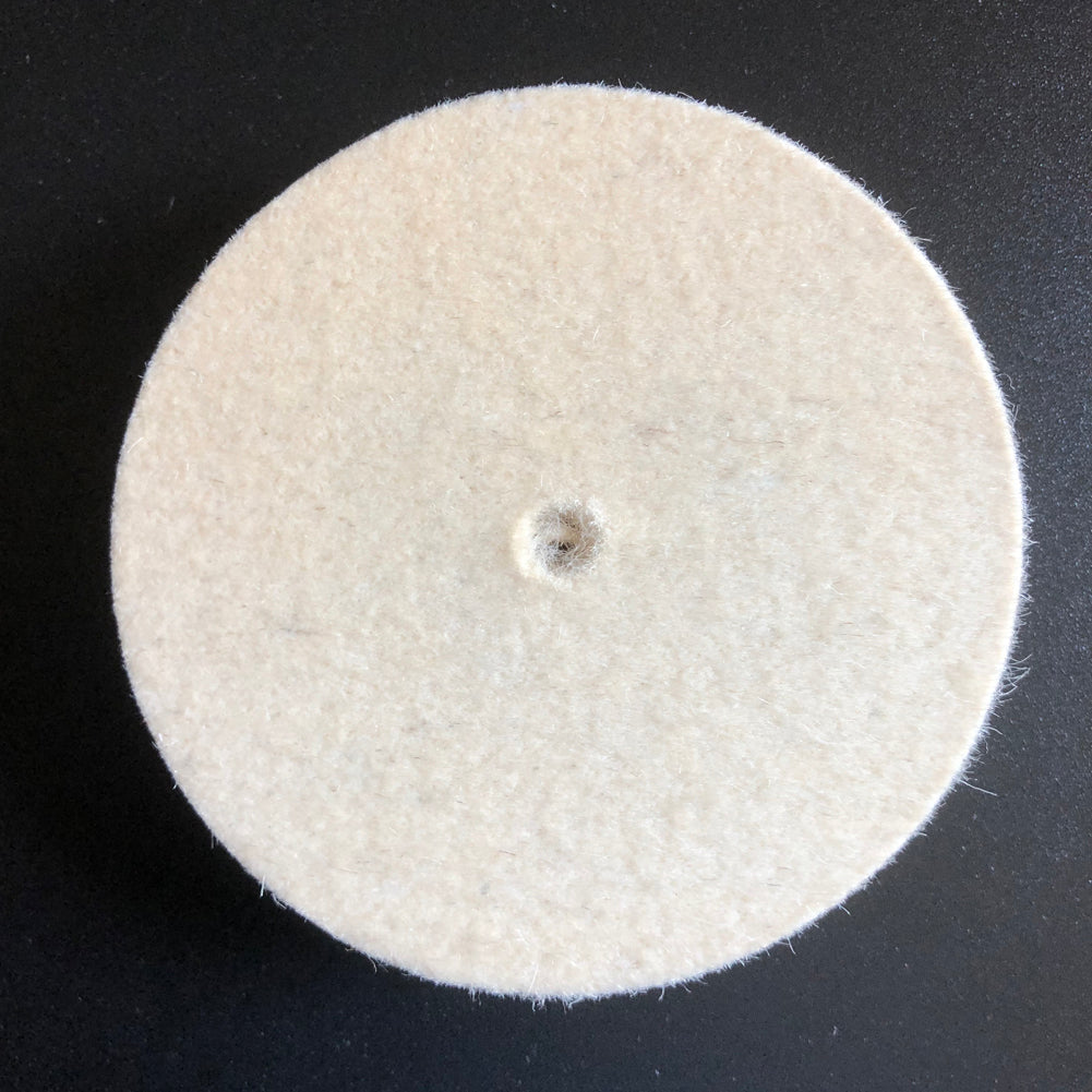 Bergeon 1207 white felt polishing wheels for watch accessories, Swiss precision cleaning tool in use.