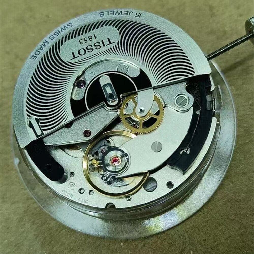 Swiss Made ETA C01.211 chronograph watch movement with 1853 white dial, precise mechanical timekeeping.