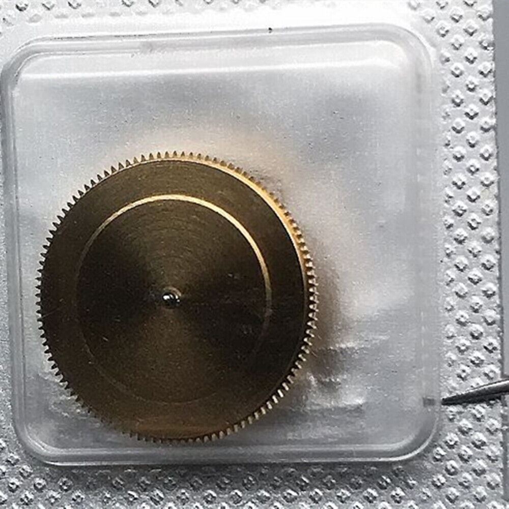 Original Omega 3303/3313 movement barrel with complete mainspring for precise watch accessory repair.