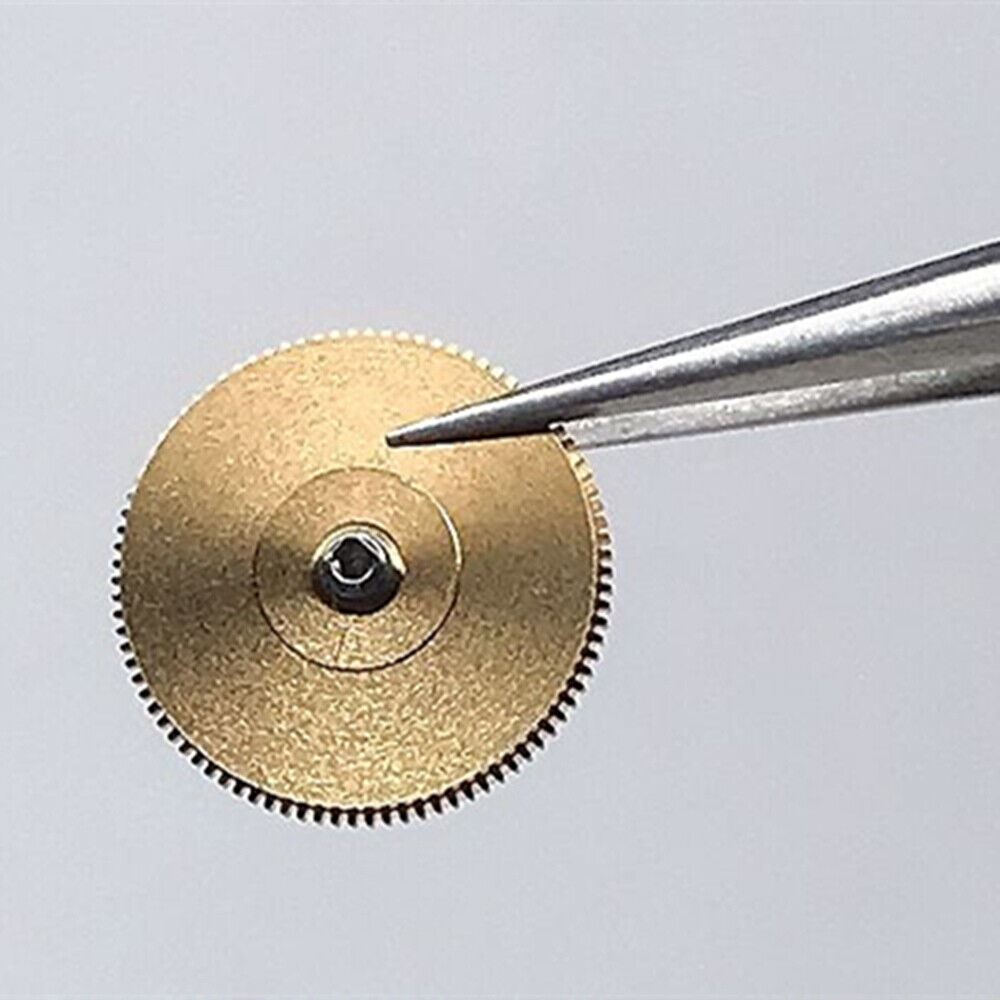 Original RLX 2235 movement barrel with complete mainspring and axis for watch repair and restoration.