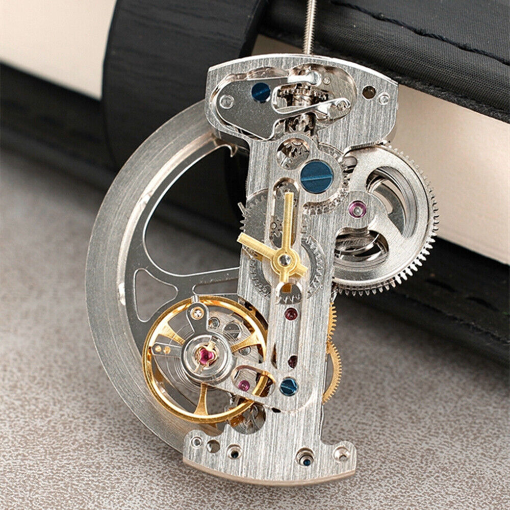 Silver rectangular bare balance wheel watch movement by Asian, model LG0807, automatic mechanical design.