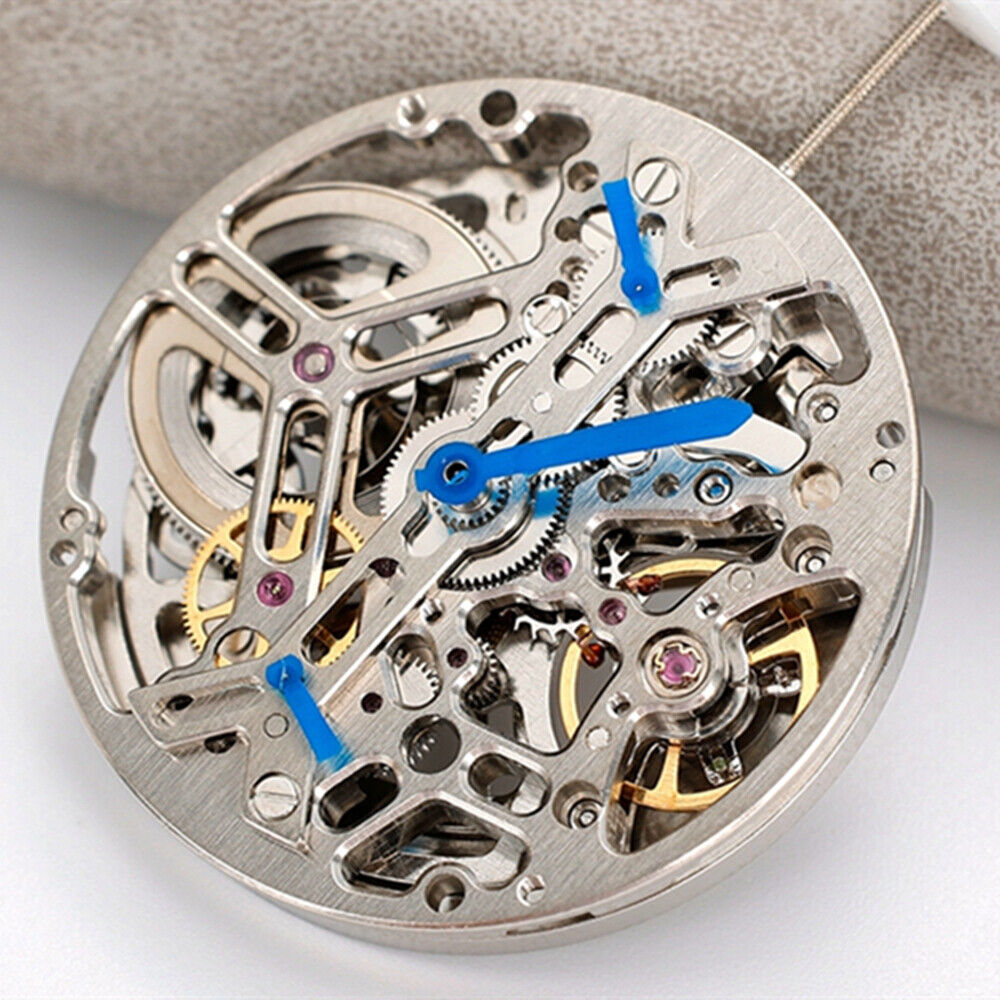 Asian HZ7590A silver watch with hollow balance wheel displaying precise automatic mechanical movement parts.