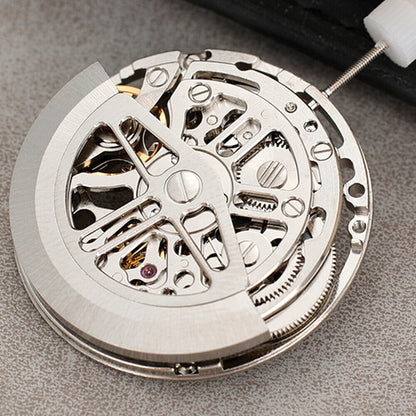 Asian HZ75DOA silver hollow balance wheel displaying precise automatic mechanical movement for watch repair.