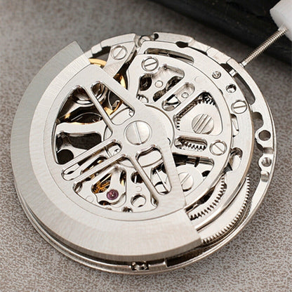 Asian HZ75DOA silver hollow balance wheel displaying precise automatic mechanical movement for watch accessories.