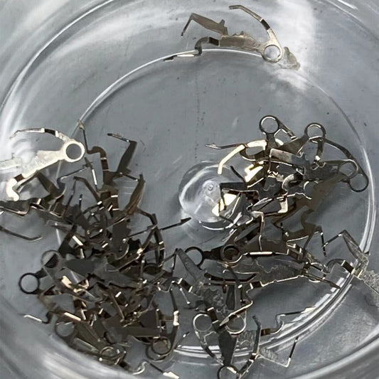 Small lever jumper for Ronda 705 watch movement, precision fit for watch repair parts.