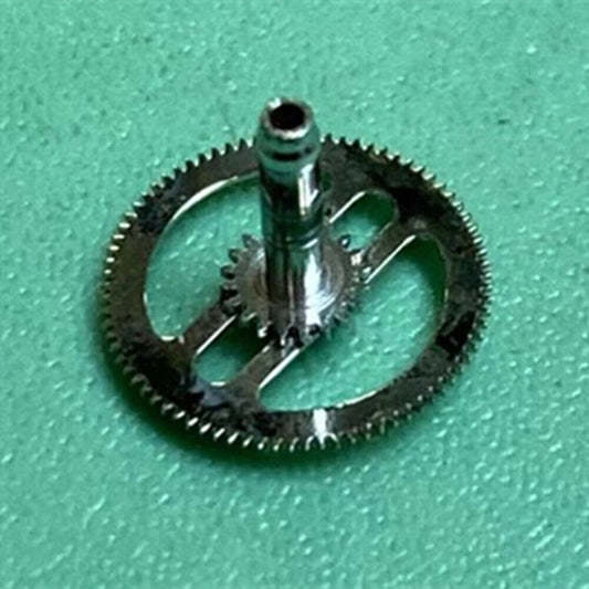 Swiss Cannon pinion and driving wheel components for ETA C01.211 watch by Swiss Cannon, detailed disassembled view.
