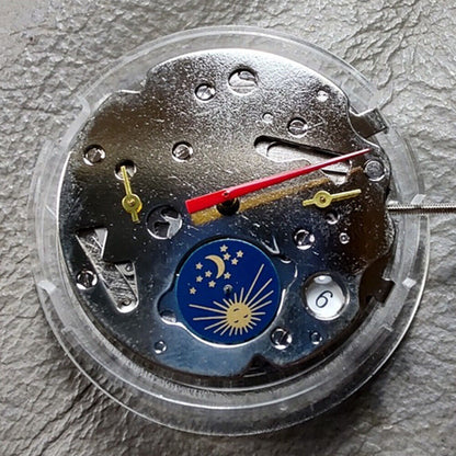 Seagull ST16 automatic watch movement with small seconds at 3, 6, and 9 o'clock positions, China made.