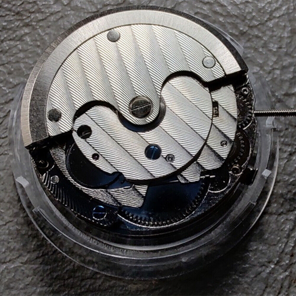 Seagull ST16 automatic watch movement showing small seconds at 3, 6, and 9 o'clock, China made.