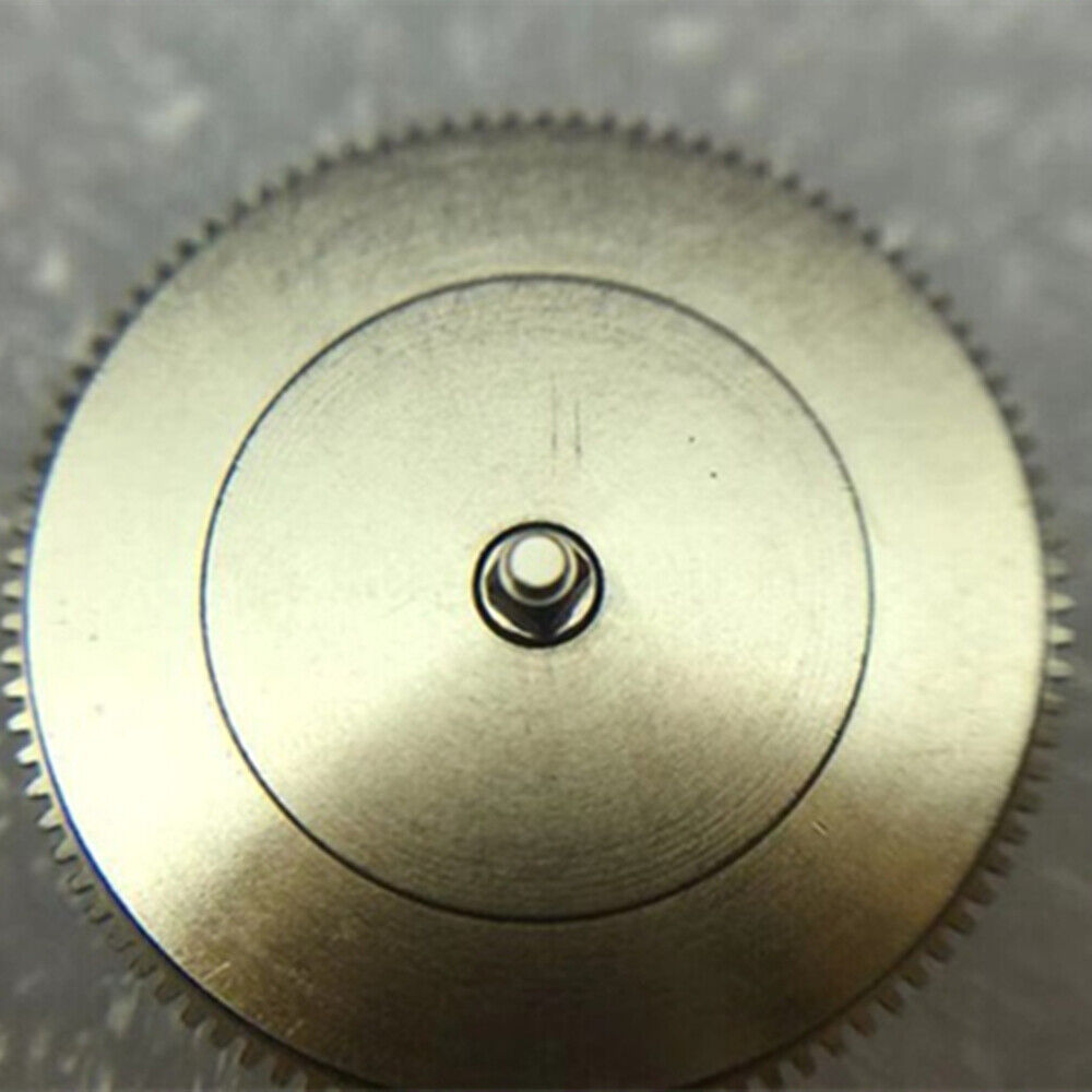Barrel with complete mainspring for Miyota 9100 watch movement, precision replacement part.