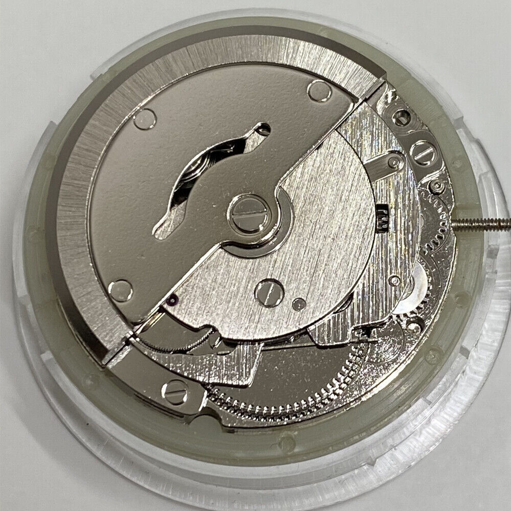 Asian Tianjin Seagull T16 watch with day-date display, automatic mechanical movement, and golden dial, ideal for elegant style.