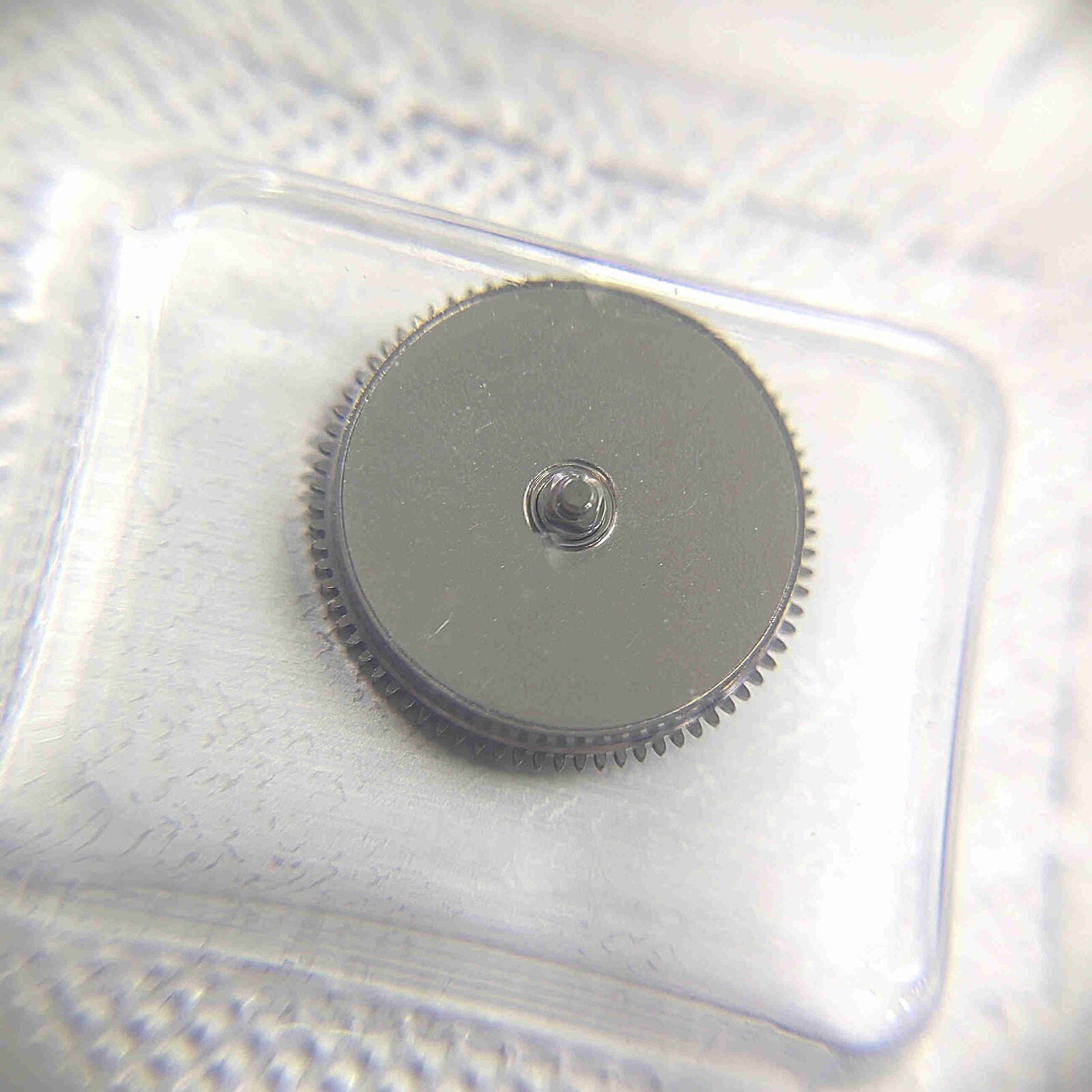Silver barrel with complete mainspring for Miyota 8200 8215 watch movement, compatible generic part.