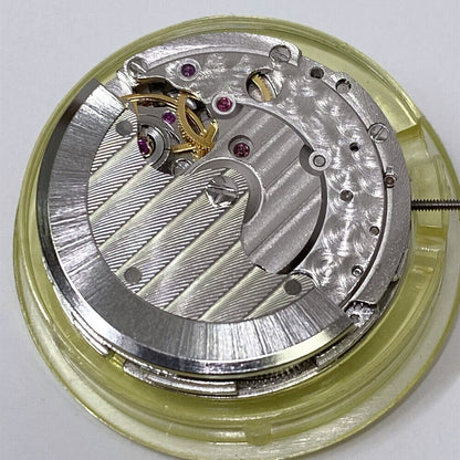 Mingzhu 2813 automatic watch movement showcasing moon phase at 12 o'clock and small second at 6 o'clock dial.