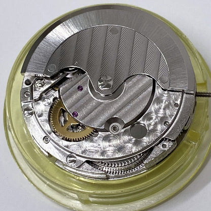 Mingzhu 2813 automatic watch movement with moon phase at 12 o'clock and small second dial at 6 o'clock.