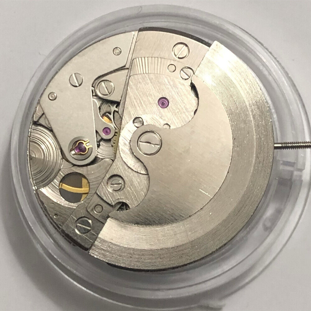 China Made 7120 watch with automatic mechanical movement, balance wheel at 9 o?clock, and moon phase at 6 o?clock.