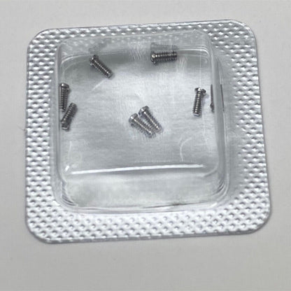 Men's 3x1mm slotted watch back cover screws by Cartier, durable replacement parts for repair.