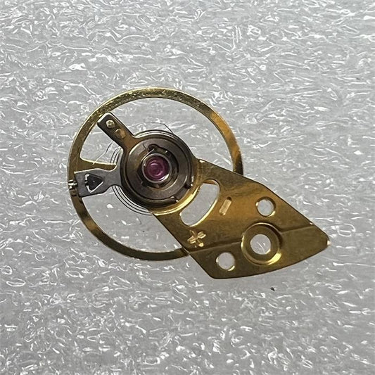 Golden balance wheel with splint for Miyota 8N24, Japan-made precision watch accessory.