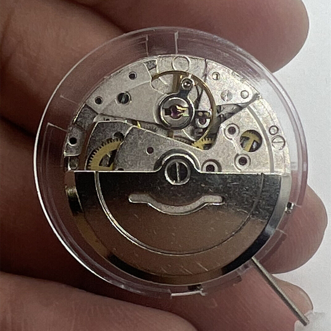 Mingzhu 2813 automatic watch movement showcasing single calendar at 6 o?clock with precise mechanical design.