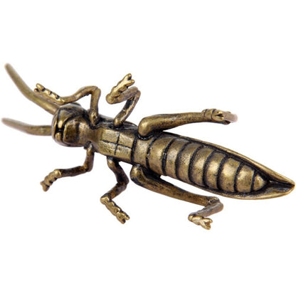 Vintage hand-carved solid copper grasshopper figurine, ideal for rustic home d�cor accents.