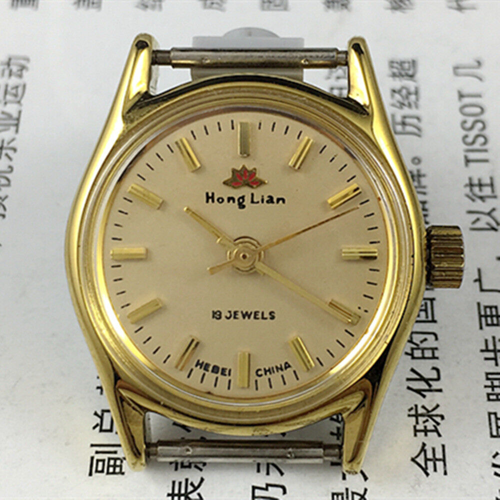 Elegant 26mm HONGLIAN manual mechanical lady watch with golden nail markers and round golden case, 3-hand display.