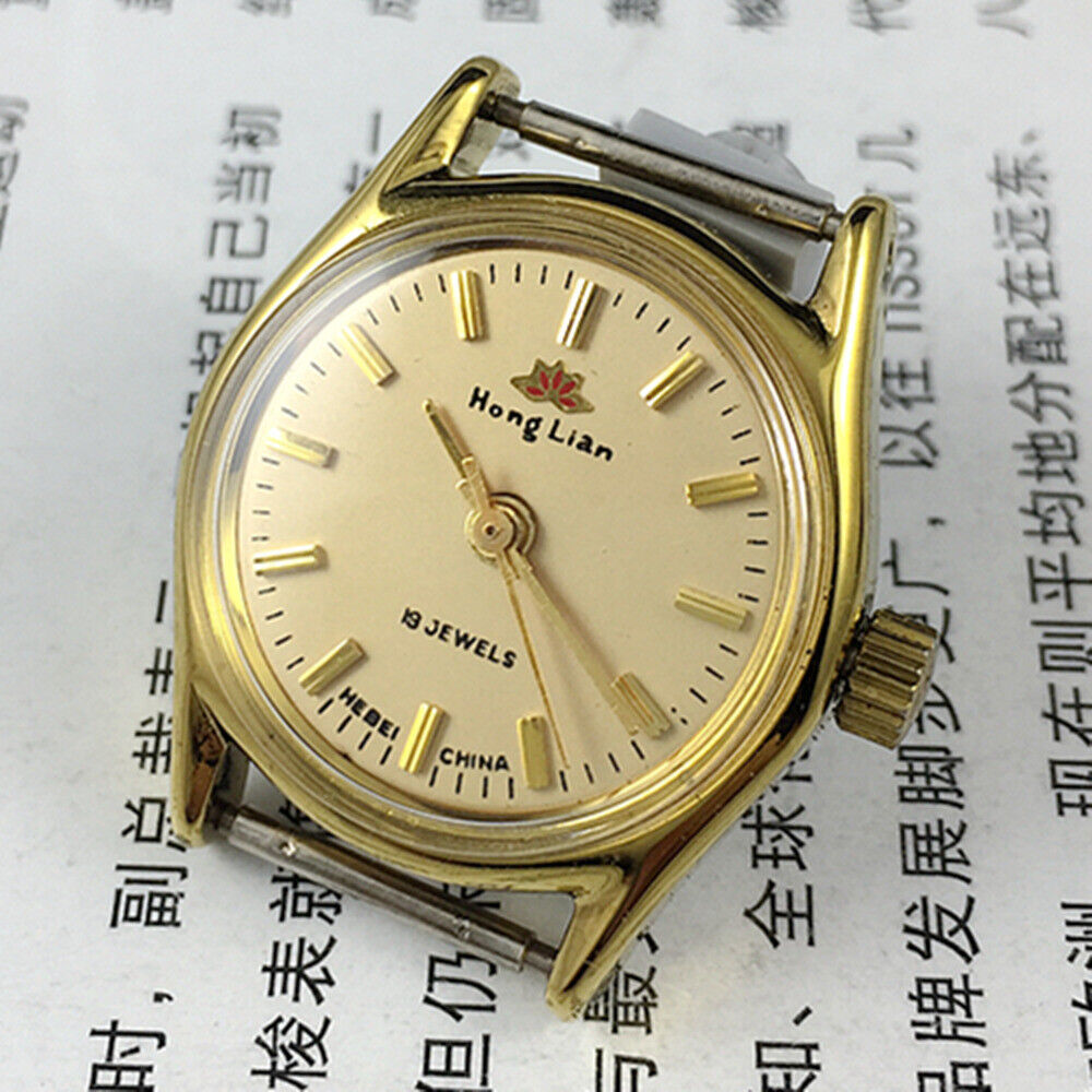 HONGLIAN 26mm elegant manual mechanical lady watch with golden nail markers and round gold case, 3-hand display.