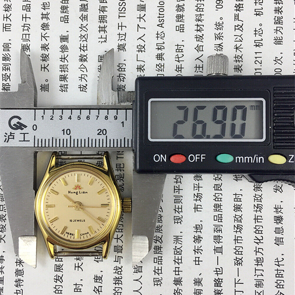 HONGLIAN 26mm manual mechanical lady watch with gold nail markers and round gold case, 3-hand display.