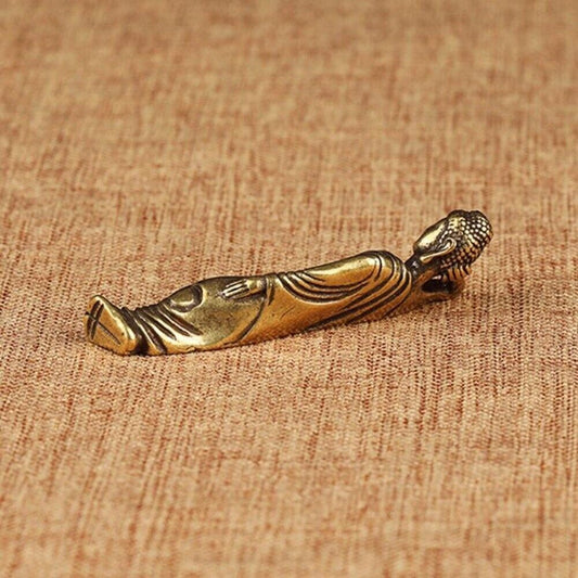 Hand-carved Copper Sleeping Buddha Shakyamuni figurine, perfect for meditation spaces.