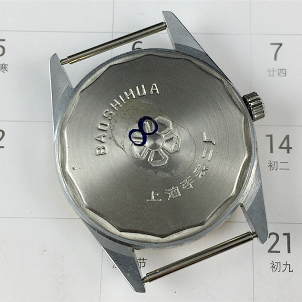 Shanghai 37mm manual mechanical watch featuring golden nail markers and round golden case design from Shanghai brand.