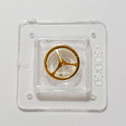 Golden balance wheel with hairspring for Orient 46941/46943 watch movement, precise timekeeping part.