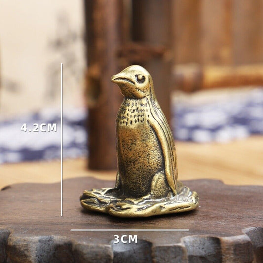 Solid copper penguin trinket with hand-carved bronze details, perfect collectible.