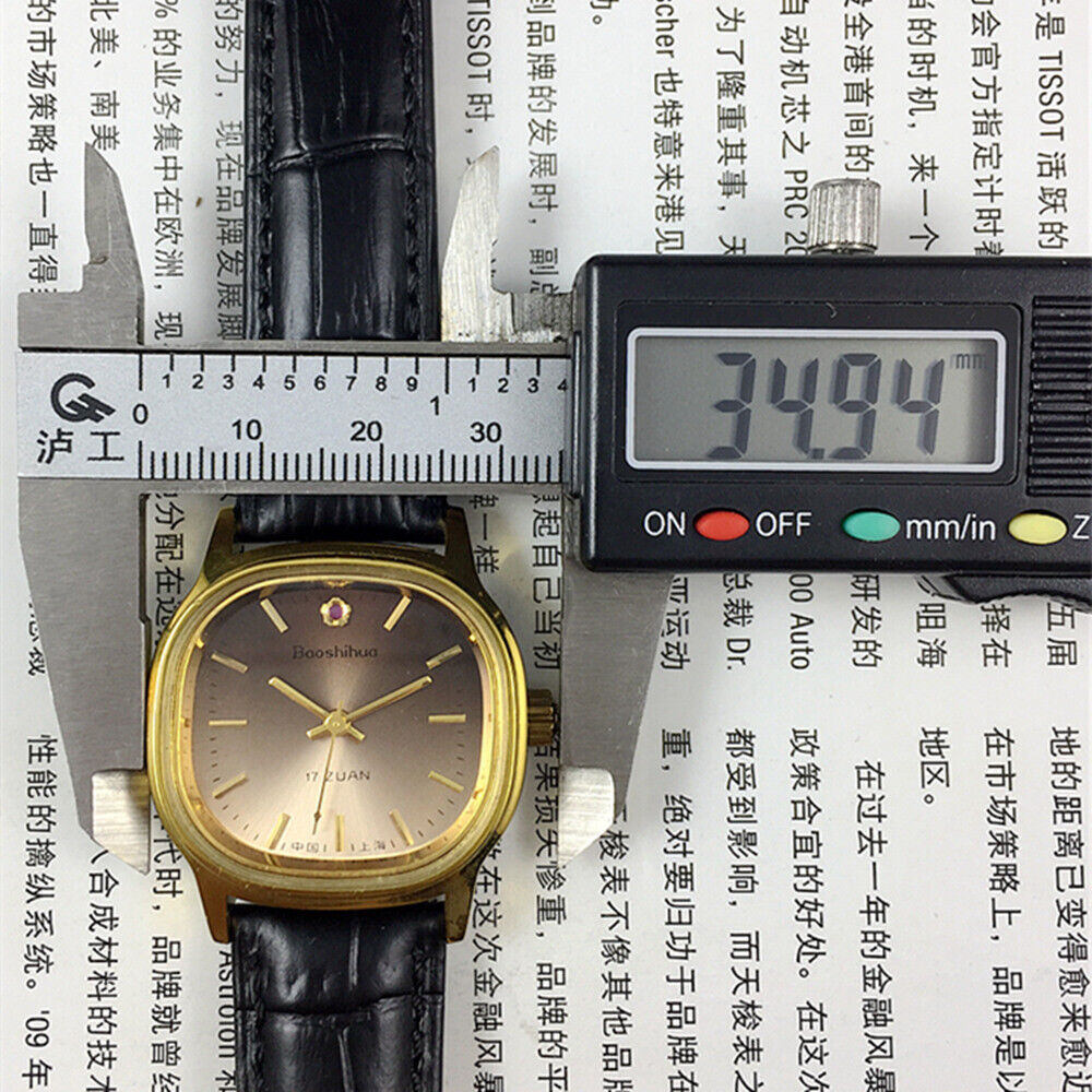 Shanghai 34mm manual mechanical watch with golden nails, brown dial, square case, 17 jewels by Shanghai brand.