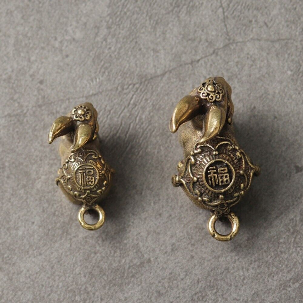Hand-carved Blessing Rabbit pendant in solid copper, detailed bronze accessory for watch lovers.