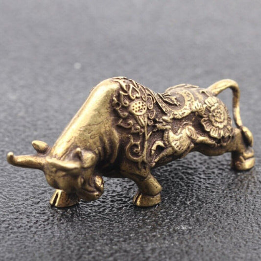 Solid copper bull figurine with detailed hand-carved bronze design, vintage-style collectible.