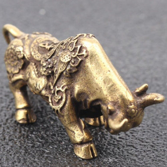 Solid copper bull figurine with detailed hand-carved bronze design, vintage-style collectible.