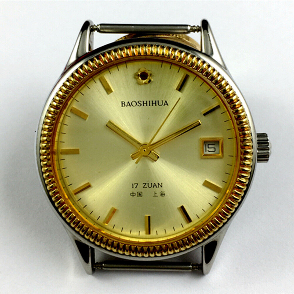 Shanghai 37mm manual mechanical watch with golden dial, round case, and 17 jewels for precise timekeeping.