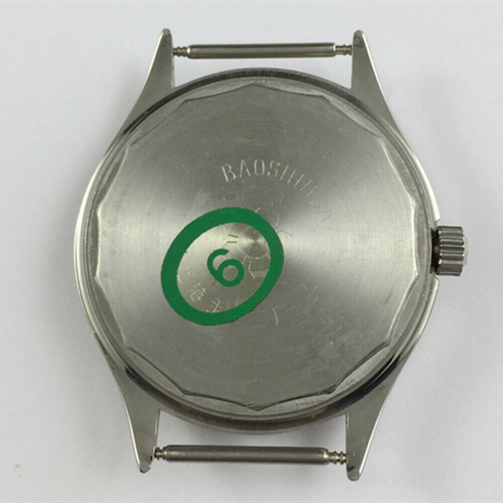 Shanghai 37mm manual mechanical watch with golden dial, round case, 17 jewels, and precise timekeeping.