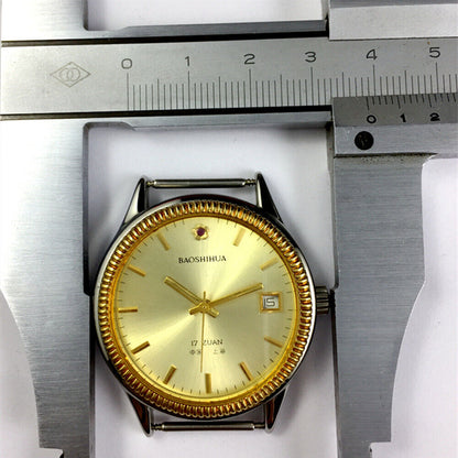 Shanghai 37mm manual mechanical watch with golden dial and round case, featuring 17 jewels for accuracy.