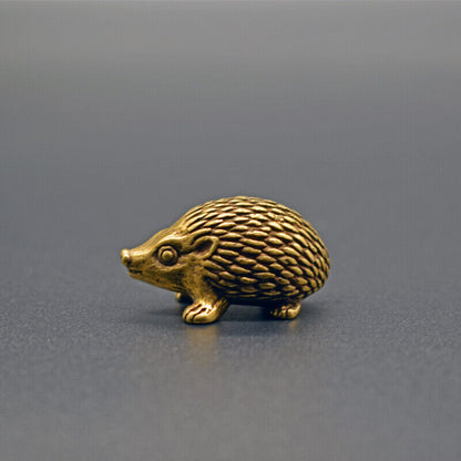 Solid copper hedgehog trinket, vintage hand-carved bronze figurine with intricate details.