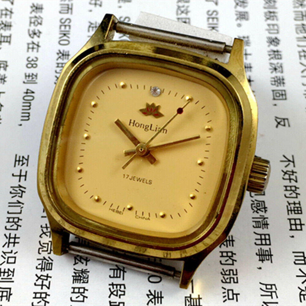 32mm HONGLIAN manual mechanical watch with golden nail markers and square case, 17 jewels, classic style.