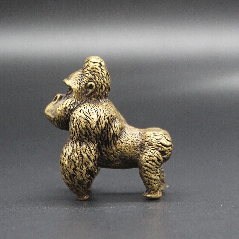 Solid copper gorilla figurine, vintage handmade bronze trinket with intricate carving details.