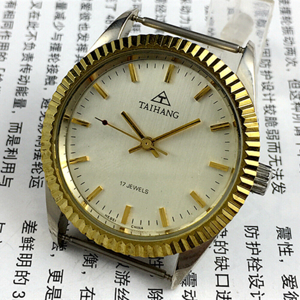 TAIHANG 38mm manual mechanical watch with silver dial, gold markers, round case, 17 jewels craftsmanship.