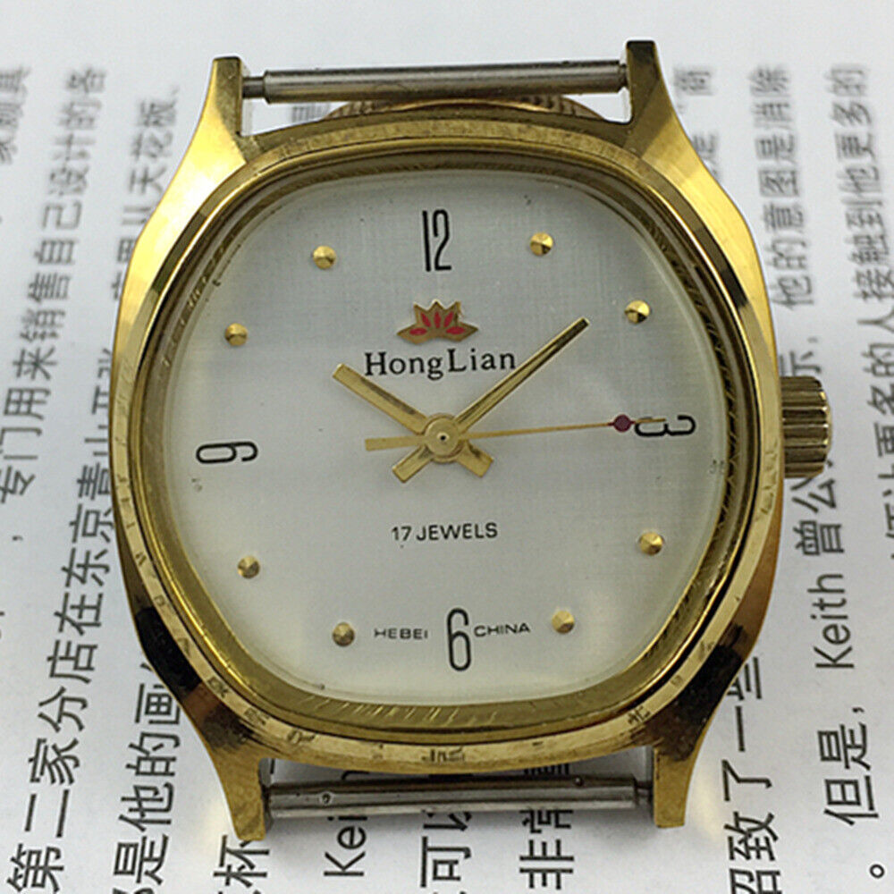 33mm HONGLIAN manual mechanical watch with golden numerals and square case for classic style.