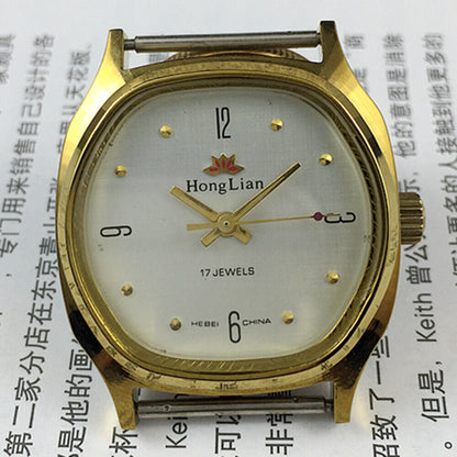33mm HONGLIAN manual mechanical watch with golden numerals and square case for classic style.