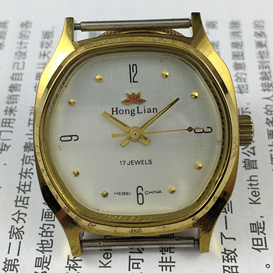33mm HONGLIAN manual mechanical watch with golden numerals and square case for classic style.