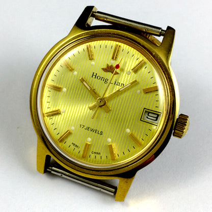 HONGLIAN 33mm manual mechanical watch with single calendar, luminous hands, and classic design.
