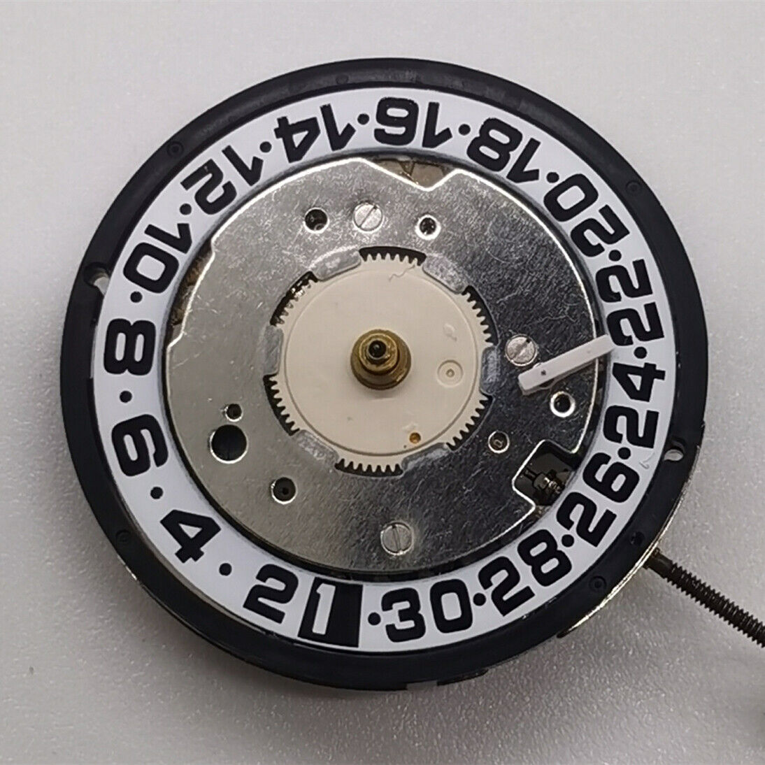 Swiss Made ISA8176A quartz watch movement with white dial, precision timekeeping by Original brand.